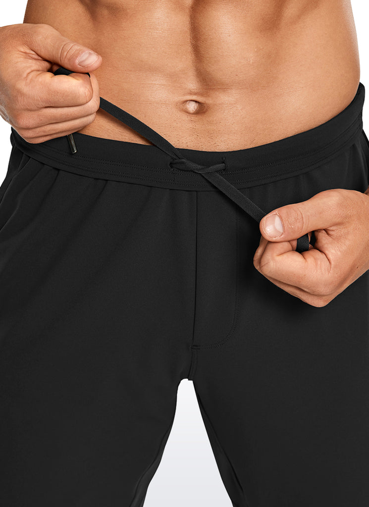 CRZ YOGA Men's Run Slim Fit On the Travel Joggers 28''- Ankle Zipper Black