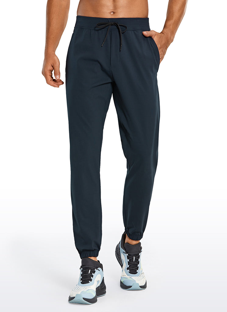 CRZ YOGA Men's Run Slim Fit On the Travel Joggers 28''- Ankle Zipper Black