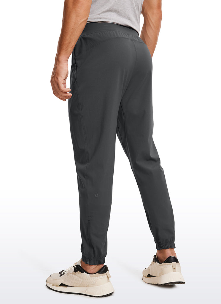 CRZ YOGA Men's Run Slim Fit On the Travel Joggers 32''- Ankle Zipper Melanite