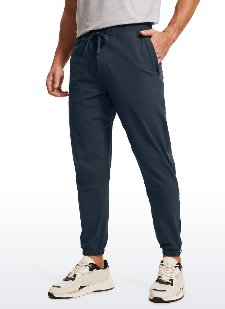 CRZ YOGA Men's Run Slim Fit On the Travel Joggers 32''- Ankle Zipper Melanite