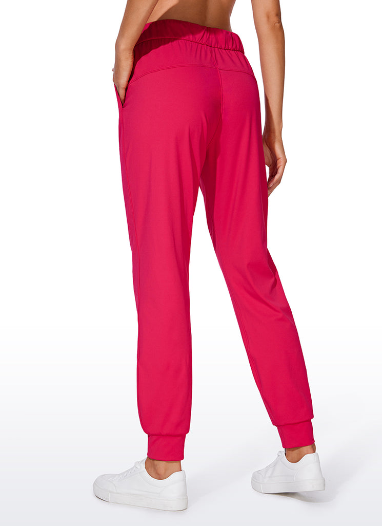 CRZ YOGA Women's Travel Slim Fit Stretch Drawstring Jogger 27'' Viva Magenta