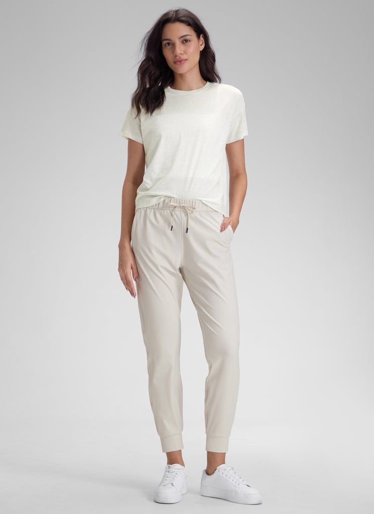 CRZ YOGA Women's Travel Slim Fit Stretch Drawstring Jogger 27'' Milky White