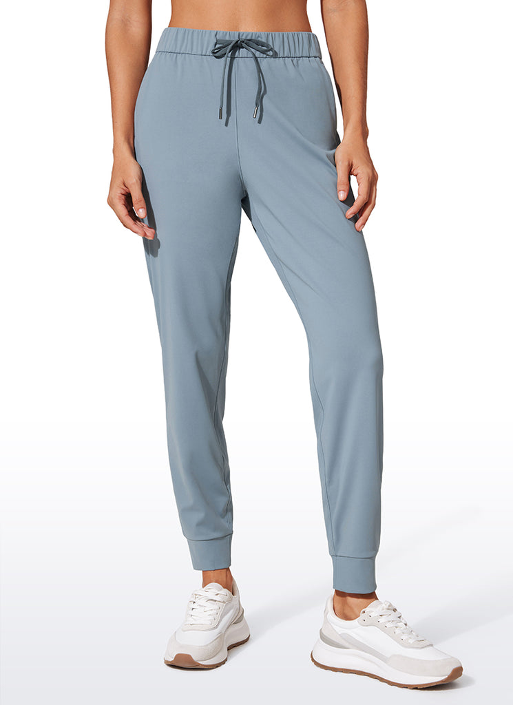 CRZ YOGA Women's Travel Slim Fit Stretch Drawstring Jogger 27'' The Cognac Brown