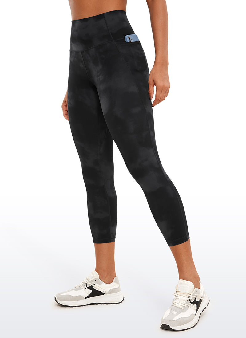 CRZ YOGA Womens Butterluxe High Waist Pockets Capri Leggings 23'' Black Tie Dye Flowers @model_info:Gigi