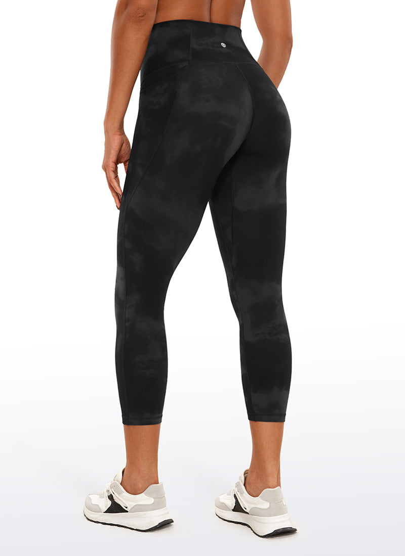 CRZ YOGA Womens Butterluxe High Waist Pockets Capri Leggings 23'' Black Tie Dye Flowers @model_info:Gigi