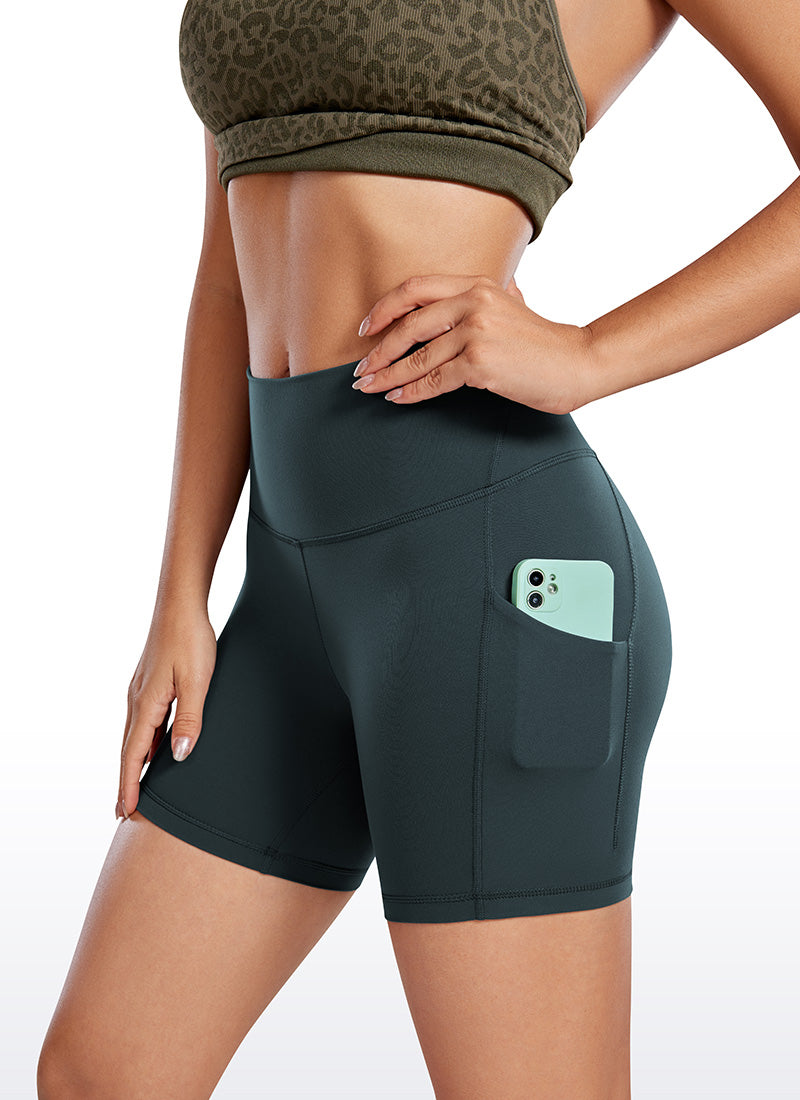 CRZ YOGA Women's Yoga High Rise Biker Butterluxe Pockets Shorts 5'' Forest Dark Green @model_info:Gabe