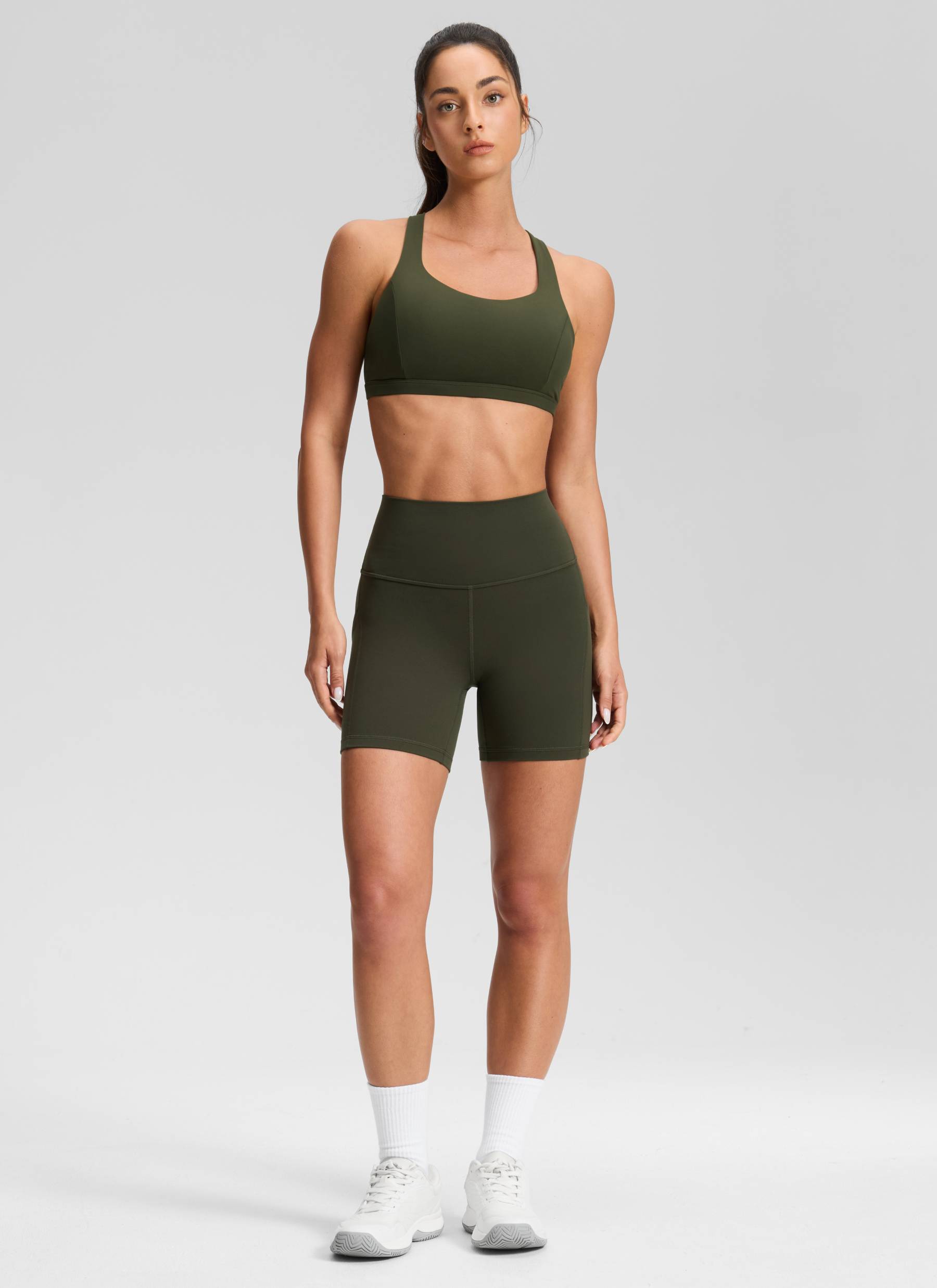 CRZ YOGA Women's Yoga High Rise Biker Butterluxe Pockets Shorts 5'' Olive Green @model_info:Isidora