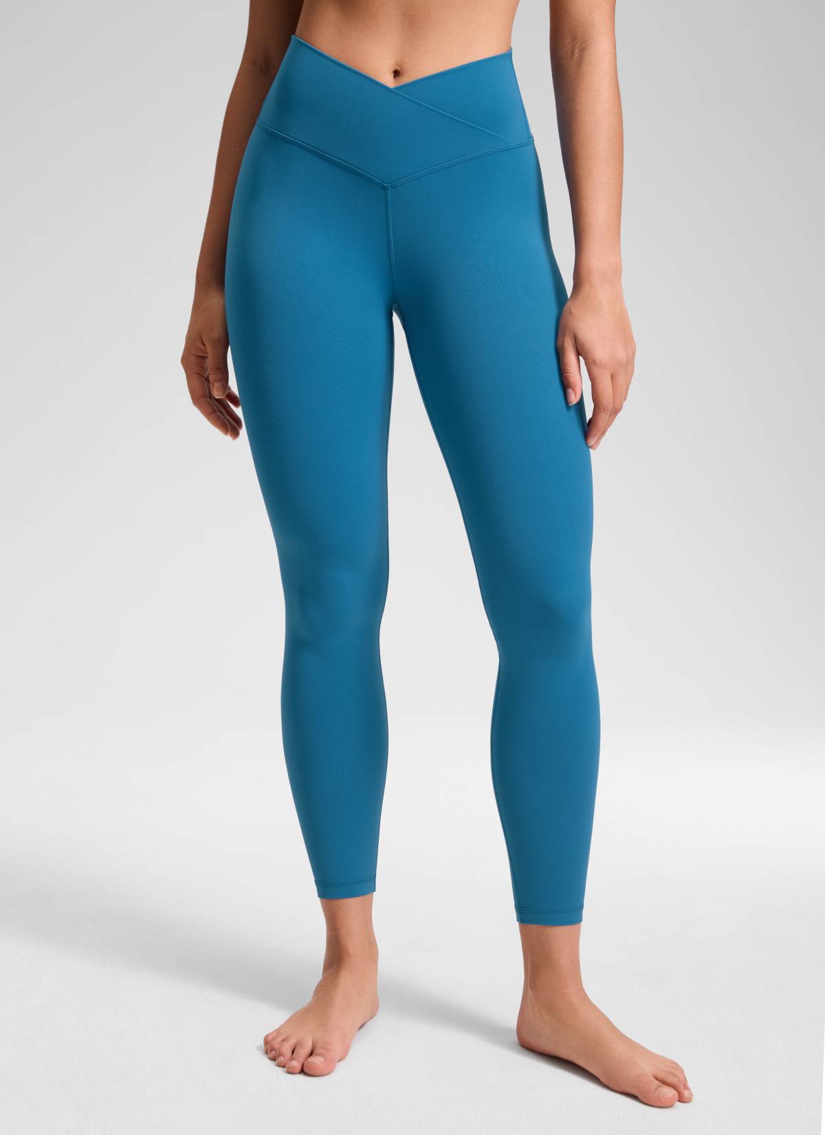 CRZ YOGA Women's High Rise Butterluxe Yoga Leggings 25'' V Cross Waist Super-sonic Blue @model_info:Fiona