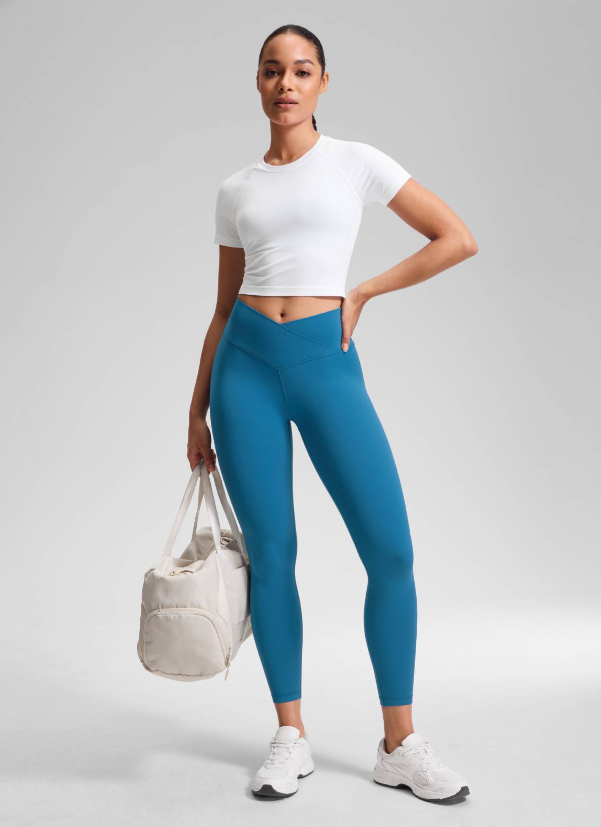CRZ YOGA Women's High Rise Butterluxe Yoga Leggings 25'' V Cross Waist Super-sonic Blue @model_info:Fiona