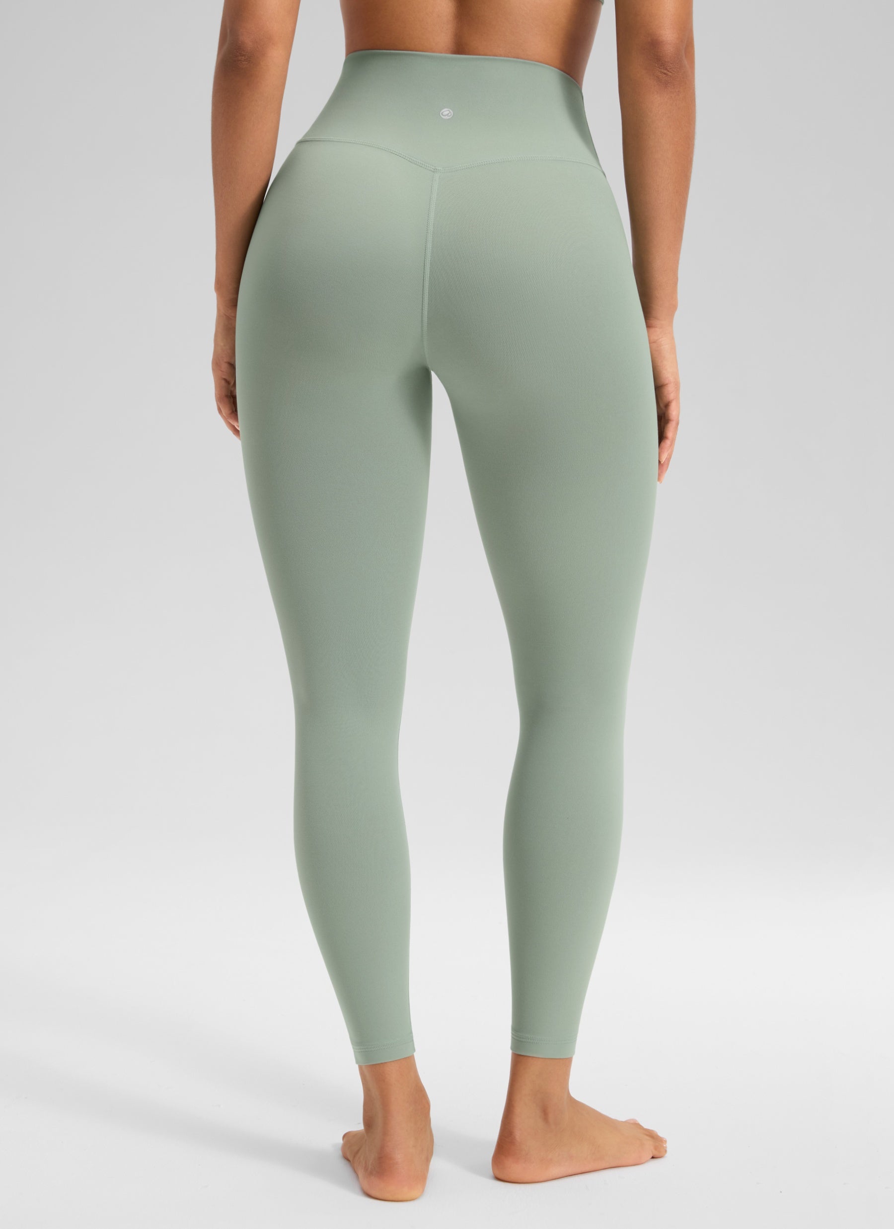 CRZ YOGA Women's High Rise Butterluxe Yoga Leggings 25'' V Cross Waist Green Palm Court @model_info:Carol