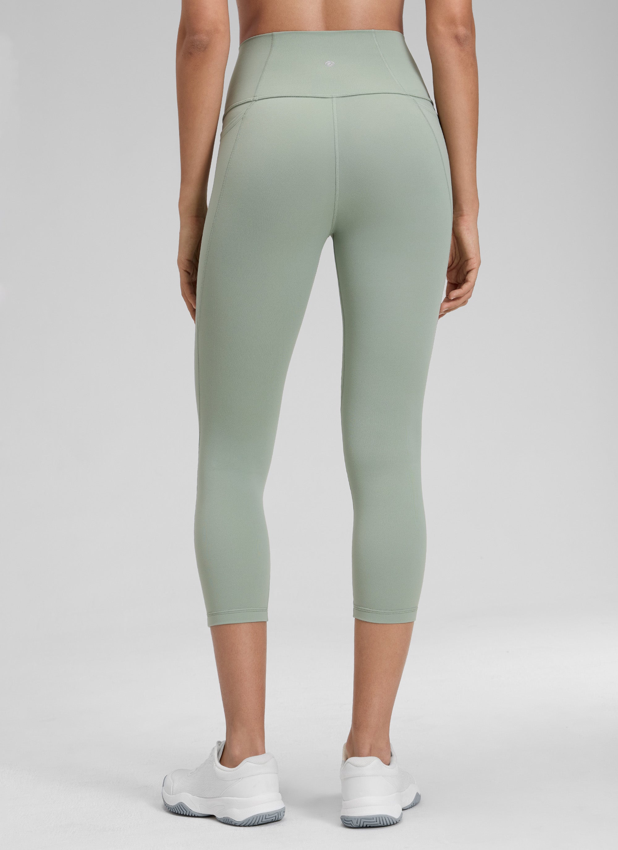 CRZ YOGA Women's Yoga High Rise Butterluxe Capri with Pockets 21'' Green Palm Court @model_info:Jenna