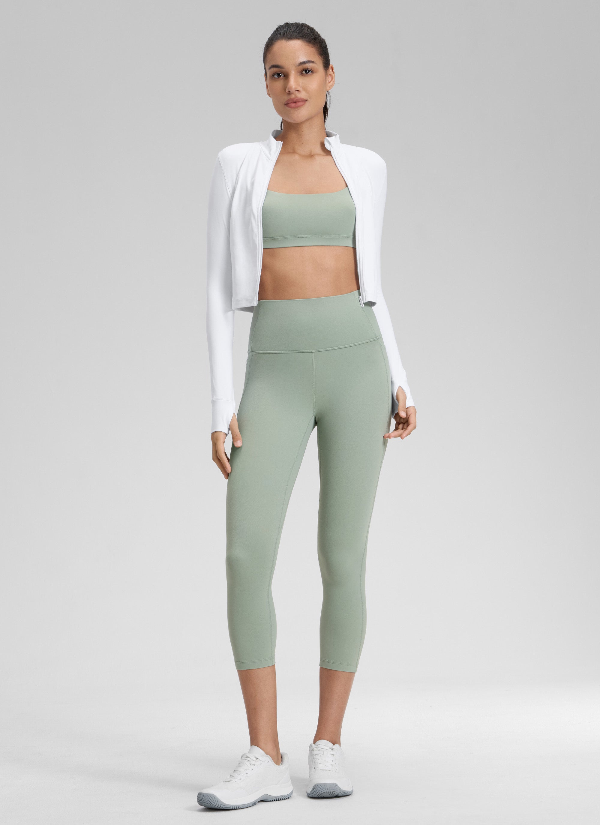 CRZ YOGA Women's Yoga High Rise Butterluxe Capri with Pockets 21'' Green Palm Court @model_info:Jenna