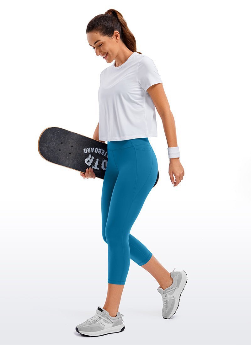 CRZ YOGA Women's Yoga High Rise Butterluxe Capri with Pockets 21'' Super-sonic Blue @model_info:Deni