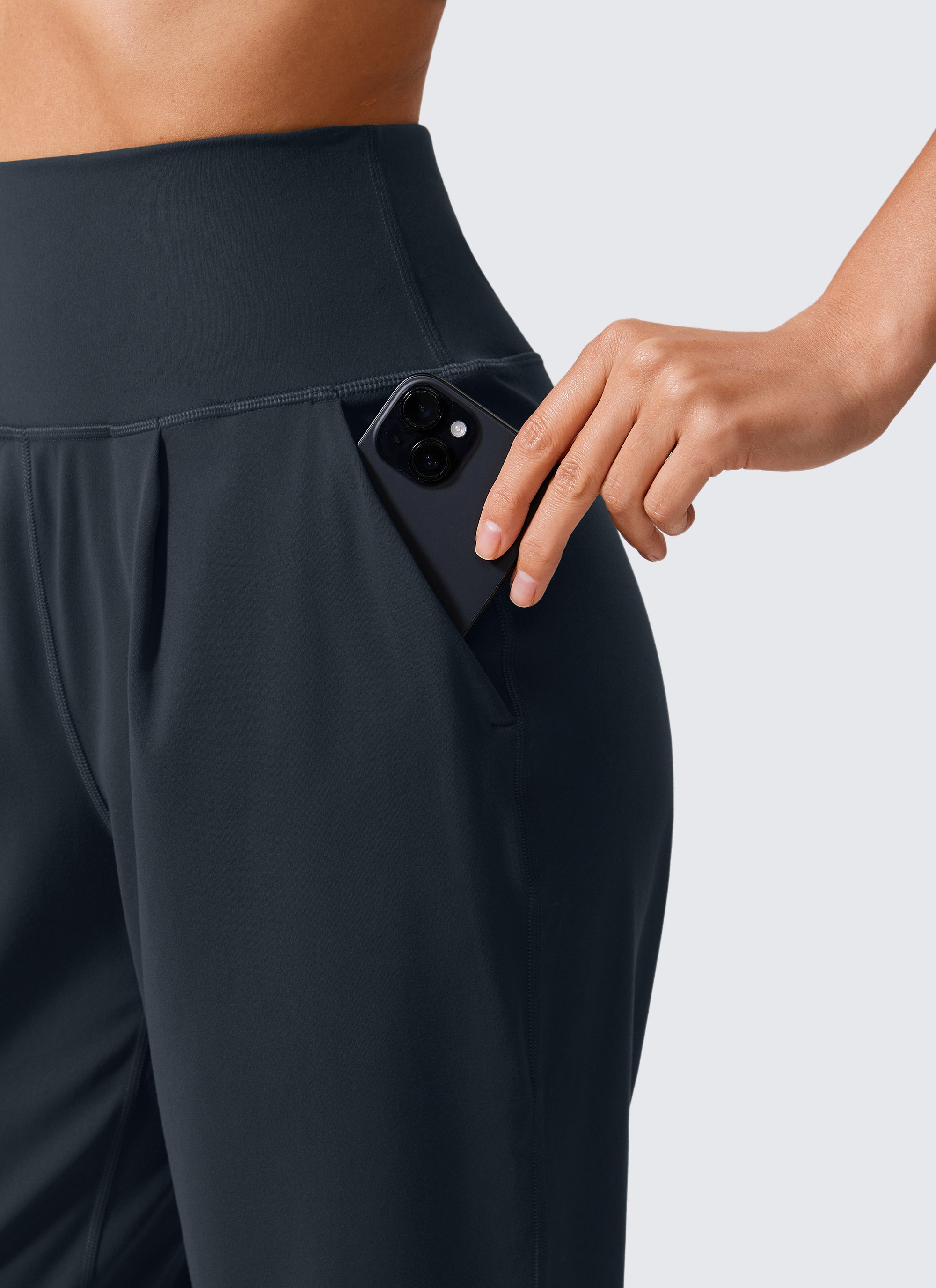 CRZ YOGA Butterlift Women's Casual High Rise Pleated Pants 27'' True Navy @model_info:Vlada