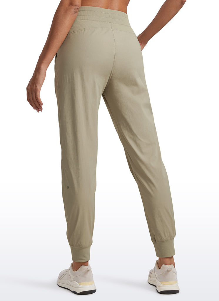 CRZ YOGA Women's Travel Classic Fit Striped Joggers 28'' Ruched French Navy