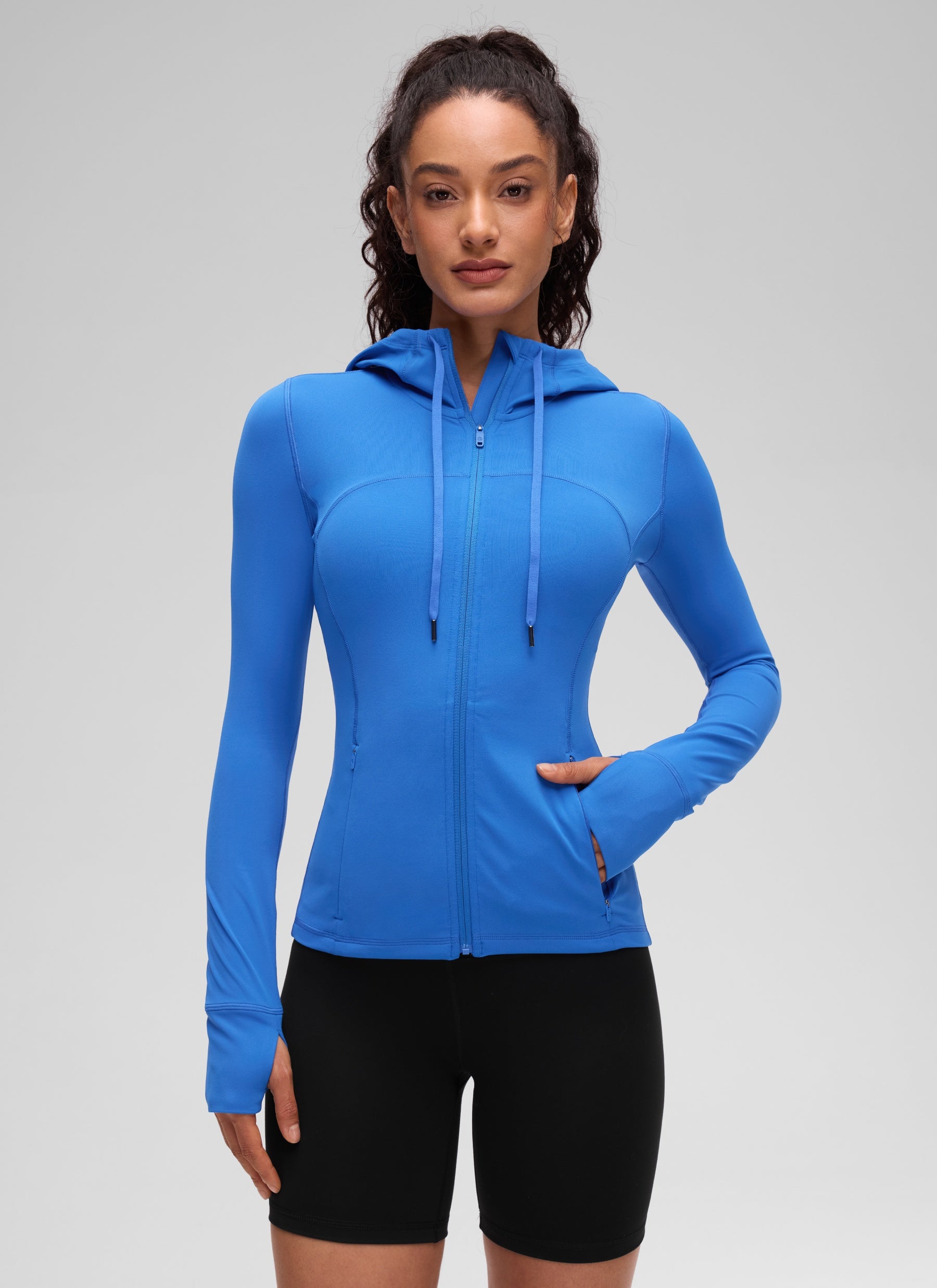 CRZ YOGA Women's Butterluxe Slim Fit Pocket Outerwear Full Zip Hoodies Sparkle Blue @model_info:Larissa