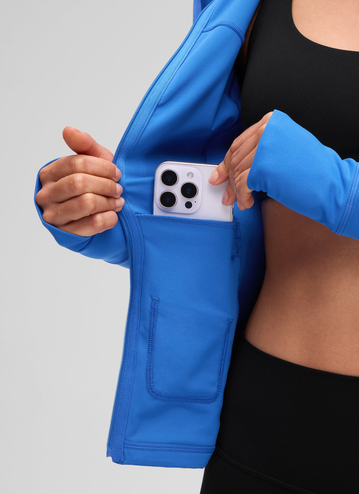 CRZ YOGA Women's Butterluxe Slim Fit Pocket Outerwear Full Zip Hoodies Sparkle Blue @model_info:Larissa